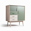 Meuble de rangement en bois clair avec portes vertes et tiroirs pour salon